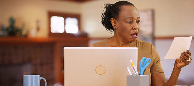 African American woman using her computer